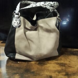 Chic Black and Cream Coach Shoulder Bag